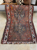 worn vintage rug