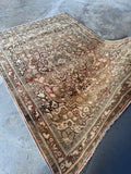 View showing intricate curvilinear motifs and warm color tones.