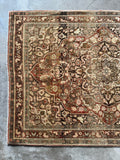 Espresso outlines adding contrast to the medallion and floral motifs.