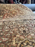 Detailed view of the fine weave and soft wool texture of the Tabriz rug.