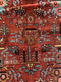 Close up of heavy-duty wool Persian Heriz rug in great condition with low pile.