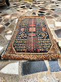 small antique Persian wool rug