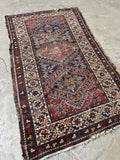 Small antique rug