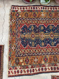 worn persian rug