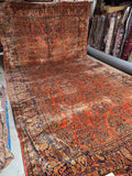 11x20 salmon coral antique Persian Sarouk rug with floral sprays and indigo border.