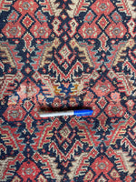 Early 20th century Persian rug with vegetable dyed wool and rich colors. Also shows a patch that blends well into the design.