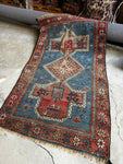 Antique 1900s Caucasian rug with French blue field and three medallions.