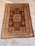 Hand knotted wool area rug 4'6 x 6' with traditional cypress tree motifs and corner spandrels.