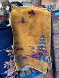 Antique Chinese Art Deco rug with pagoda scene on a yellow field.