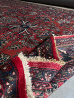 Persian rug showing the underside view of the weave texture.