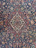 Heavy wool antique Persian entry rug featuring rich vegetable dyes and aged patina.