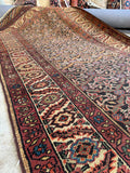 Vintage Persian Bakhtiari runner, hand knotted antique hallway rug woven from vegetable dyed wool with beautiful artisan variations and low pile.