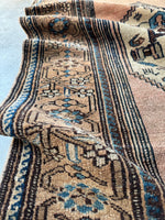Close up of border band with mellow color palette.