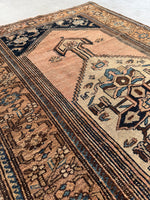 1920s Persian rug with vegetable-dyed wool and naturally aged colors.