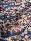 Close-up of natural vegetable-dyed wool in navy, red, and ivory.