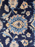 Hand knotted Persian Kashan rug with fine weave and soft vegetable dyed wool.