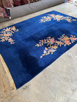 1930s Chinese Art Deco floor rug, minimalistic design with floral clusters.