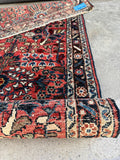 Warm-toned Persian runner from the 1930s underside.