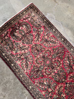 Floral Sarouk Persian rug in soft watermelon pink tones.