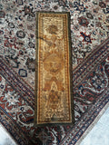 Antique late 19th century French tapestry panel with cherubs and floral vase motif.