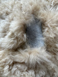 Cleaning, Repairs and Thick Rug Pad for Large Shaggy Sheepskin Rug