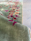 Vintage Chinese floral rug green field