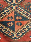 3x5 geometric Kazak rug, brick red Caucasian rug with four stacked medallions and vegetable dyed wool.