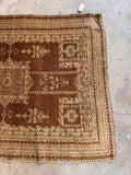 Neutral brown Agra accent rug with vegetable dyed wool.