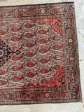 side view of vintage persian vintage rug with ferahan art