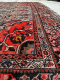 Worn low-pile Persian rug with stout and solid construction