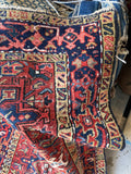 Corner shot of persian heriz rug