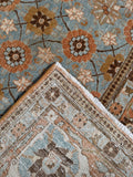 Underside view of the fine hand knotted weave of this vintage 1920s Persian Tabriz rug.