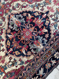 Persian Kerman Lavar rug hand knotted in the 1880s with a tight weave, detailed floral motifs and natural vegetable dyed wool.