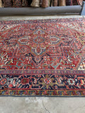 9x12 collectible antique Persian Heriz rug, hand knotted wool carpet with bold architectural design.