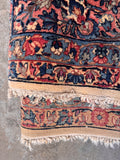 Back of the rug showing the tight hand-knotted construction and fine wool foundation.