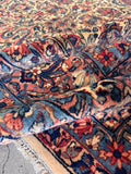 Wool texture view of the antique Persian rug revealing the soft pile and vintage patina.