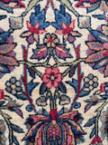 Close up of the vegetable-dyed wool fibers showing multi-tonal antique coloring.