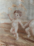 Close-up of one of the cherub-like children.