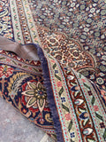Fine weave Persian Tabriz rug 6'7 x 9'7 with a traditional central medallion, Mahi pattern and wool with silk highlights.