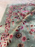 Vintage Chinese floral rug green field