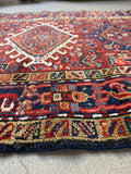 Close up of heriz scatter rug
