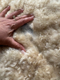 Cleaning, Repairs and Thick Rug Pad for Large Shaggy Sheepskin Rug