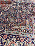 Handwoven Tabriz Persian rug 7x10 with natural vegetable-dyed wool, silk accents and detailed water garden motifs.