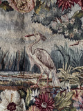Close-up of Heron in antique French Tapestry.