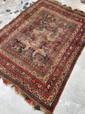 Small antique rug