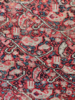 Detailed view of tight weave and classic Ferahan boteh design

