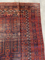 worn persian rug