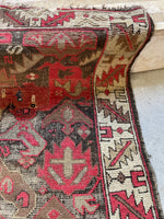small antique Persian rug
