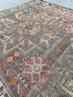 worn vintage rug