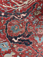 Low pile handwoven rug with border turtles and powerful floral medallions

